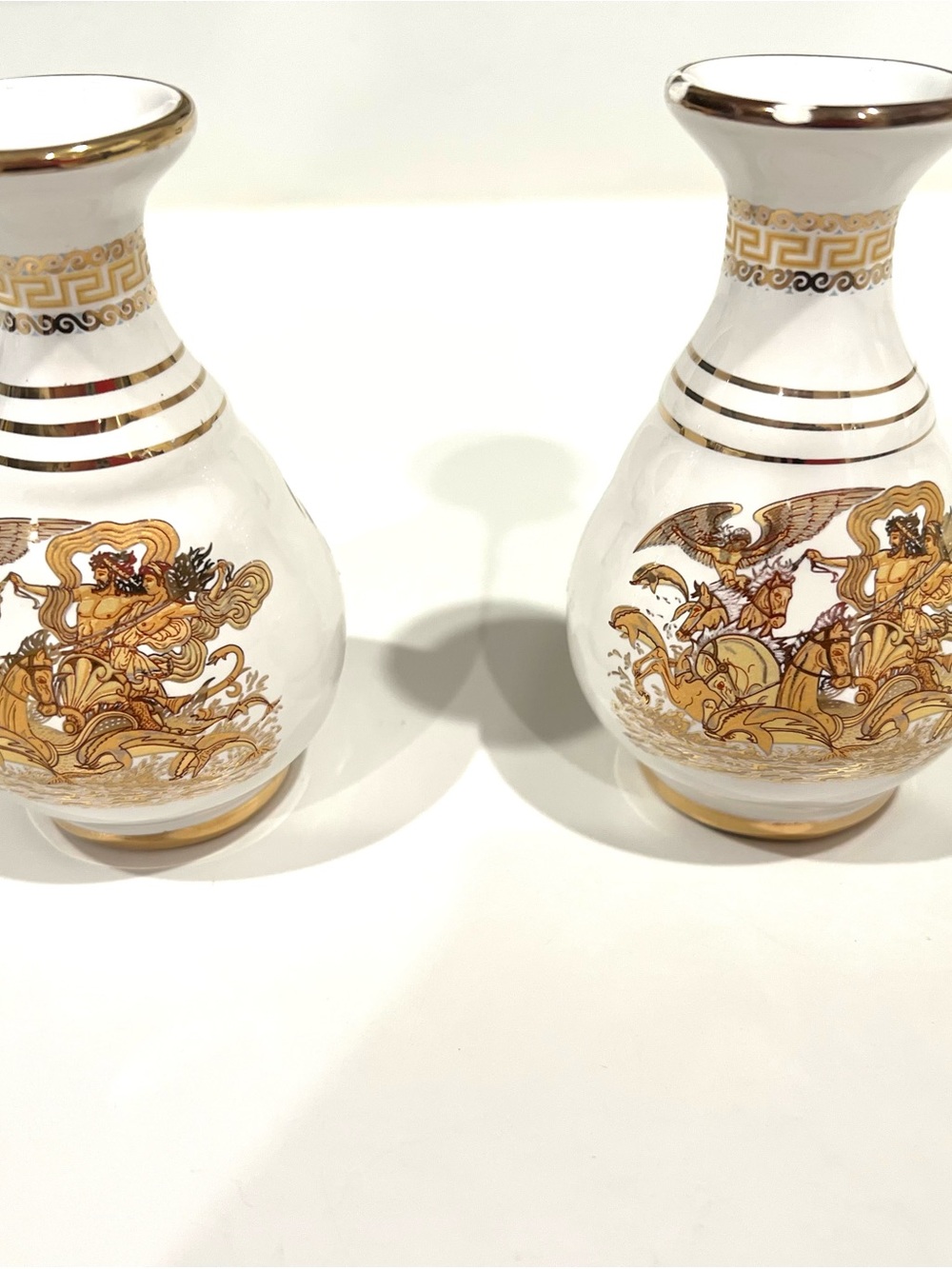 White and Gold Greek Porcelain Vase Pair with Ornate Gilded Detail